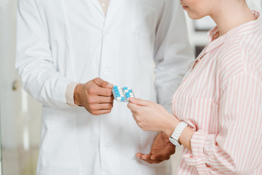 Implanon 9 cropped view of druggist giving to customer bliste 2024 11 17 01 11 25 utc 1