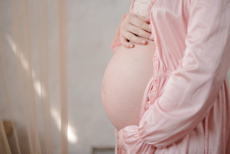 pregnant lady holding belly